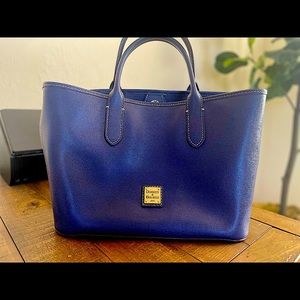 Dooney & Bourke with additional crossbody strap.